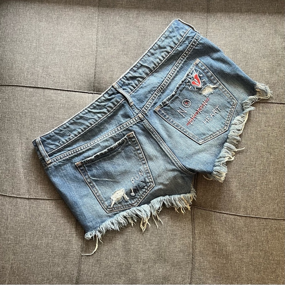 Express distressed cut-off shorts with embroidery